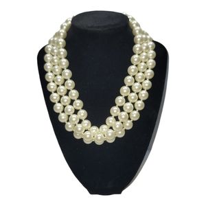 Diamonique and Simulated Pearl Three Strand Necklace.